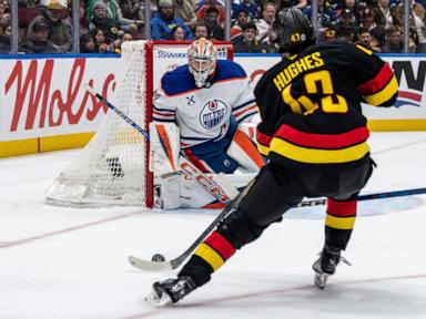 Quinn Hughes scores 2 power-play goals as Canucks beat Oilers 3-2