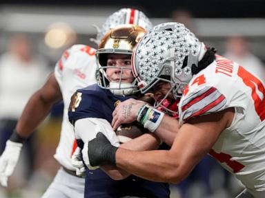 Ohio State wins 1st national title since 2014, outlasting Notre Dame 34-23 in CFP championship game