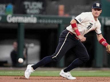 Italian rookie Sam Aldegheri gets 1st major league victory, helping the Angels beat the Rangers 5-1