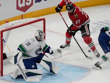 Heinen scores twice as the Canucks beat the Blackhawks 6-3 for their 3rd straight win