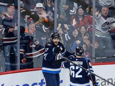 Connor Hellebuyck makes 26 saves in the Jets' 4-2 victory over the Canadiens