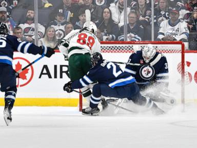 Connor scores power-play goal in OT to give Jets 2-1 win over Wild