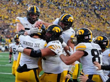 No. 17 Iowa drives for last-play TD to beat No. 18 Michigan 20-19