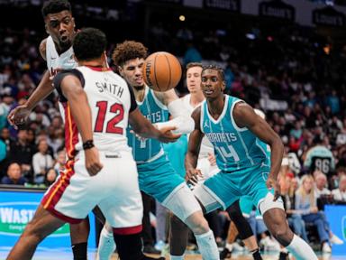 Jimmy Butler's scores 13 of 26 points in fourth quarter as Heat hold off pesky Hornets 114-106