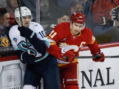 Beniers scores on overtime power play to cap Kraken's rally in 3-2 victory over Flames