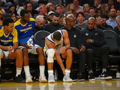 Stephen Curry sprains left ankle in Warriors' loss