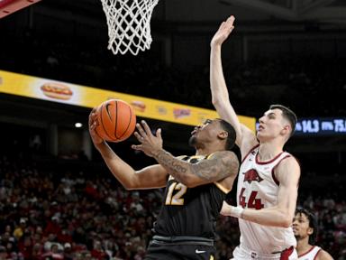 Zvonimir Ivisic scores 20, Johnell Davis adds 18 and Arkansas beats No. 15 Missouri 92-85