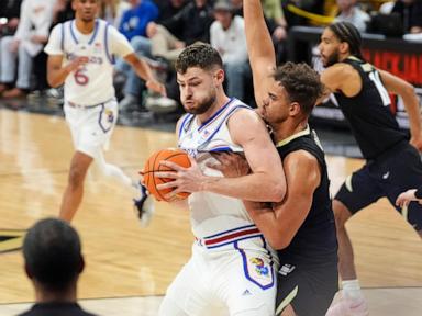 Hunter Dickinson posts double-double to lead Kansas over Colorado 71-64