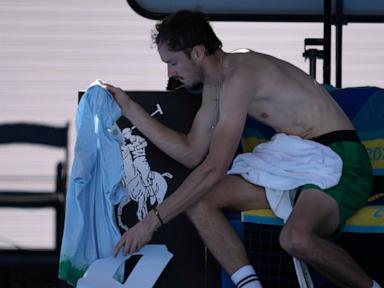 Daniil Medvedev destroys a TV camera attached to the net during his 5-set Australian Open win