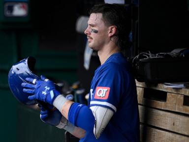 Frazier's pinch-hit, two-run single lifts the Royals to a series sweep of the Nationals