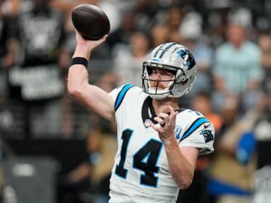 Andy Dalton passes for 319 yards and 3 TDs to lead Panthers past Raiders 36-22 for first win