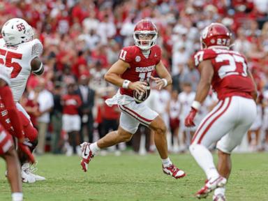 Arnold throws 4 TD passes -- 3 to newcomer Burks -- to help No. 16 Oklahoma rout Temple 51-3