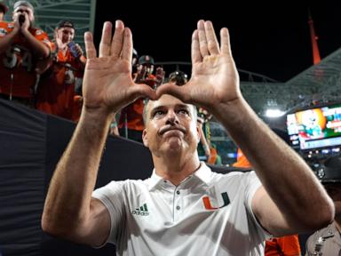 The football alumni are flooding Miami's sidelines. The unbeaten Hurricanes are seeing the benefits