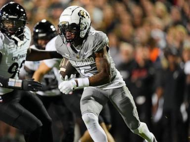 Shedeur Sanders, Travis Hunter help Colorado beat Cincinnati 34-23 to become bowl eligible