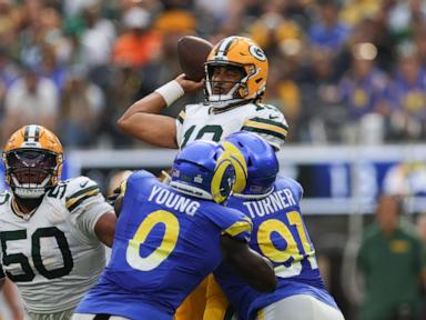 Jordan Love throws a pair of TD passes in the second half to rally Packers past Rams 24-19