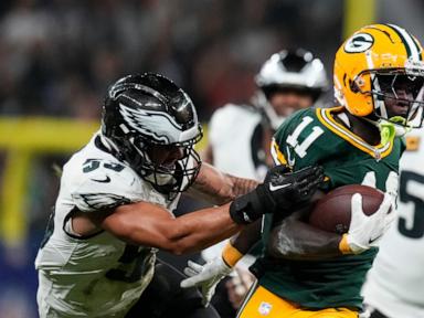 Barkley scores 3 TDs as Eagles beat Packers 34-29 in Brazil. Packers' Love injured in final minute