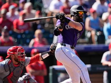 Blackmon drives in 3 runs in one of the last games of his career as Rockies beat Cardinals 10-8