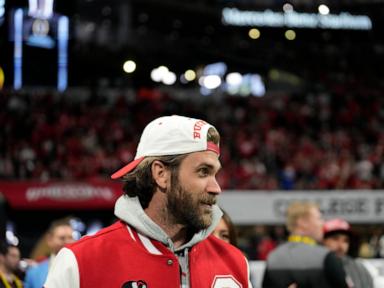 LeBron James cheers on Ohio State at College Football Playoff championship game