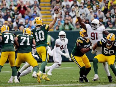 Doubs catches 2 TD passes in his return from a suspension to help Packers rout Cardinals 34-13