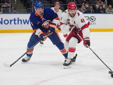 Nelson scores in OT as Islanders rally to beat Hurricanes 3-2