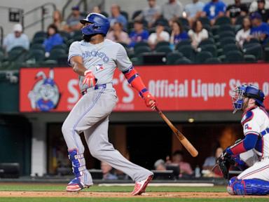 Langford and Taveras homer, struggling Heim has key hit as Rangers beat Blue Jays 13-8