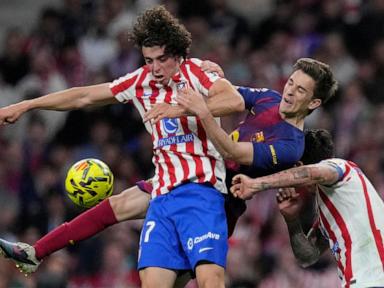 Barcelona overcomes 10-man Atletico and boosts La Liga lead after Real Madrid loses