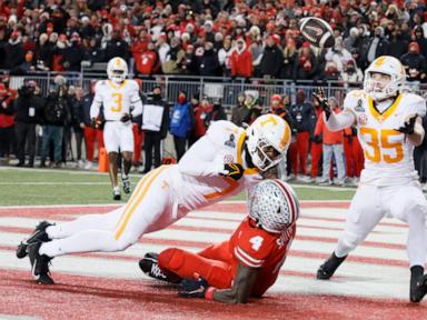 Howard throws 2 TD passes to Smith to help Ohio State rout 42-17 in College Football Playoff