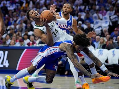 Lillard and Antetokounmpo power Bucks past short-handed 76ers 124-109