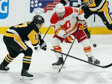 Bunting, Letang and Tomasino score on the power play, lifting the Penguins over the Flames 6-2