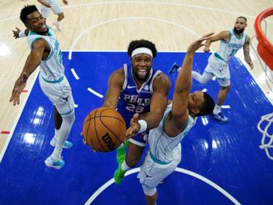 Jared McCain and Guerschon Yabusele lead the 76ers to 107-105 OT win over the Hornets