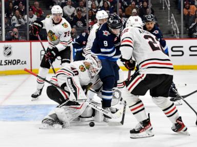 Scheifele scores twice as Jets rally to beat Blackhawks in OT