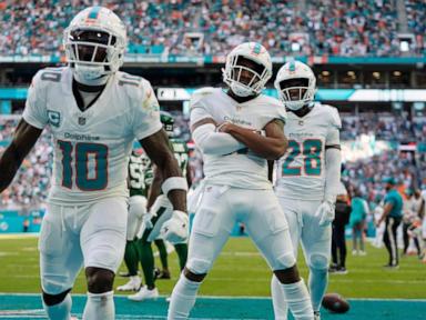 Tua Tagovailoa's TD pass to Jonnu Smith gives Dolphins 32-26 overtime win over Aaron Rodgers, Jets