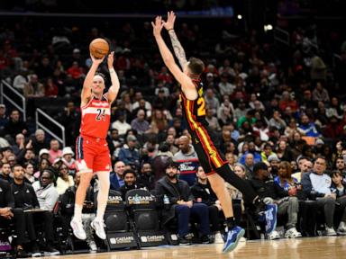 Trae Young scores 35 points and has 14 assists in Atlanta's 125-111 victory over Washington