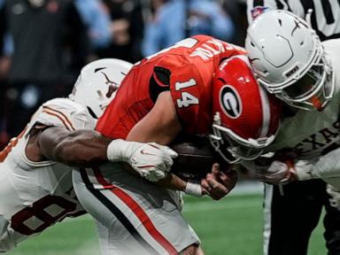 Georgia QB Carson Beck returns from hand injury for final snap in SEC championship OT win over Texas