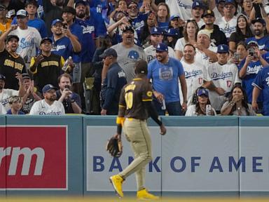 Dodger Stadium fans toss balls and trash on field, interrupt Padres' 10-2 win that evens NLDS