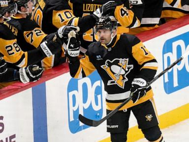 Rust helps Penguins beat Canucks 5-4 to snap three-game skid