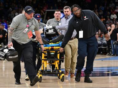 Medics attend to fan who collapsed courtside at Spurs, Grizzlies game