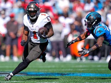 Bucky Irving runs for 2 TDs and Bucs force 4 turnovers in 43-13 rout of Panthers