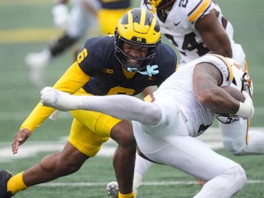 No. 12 Michigan holds off Minnesota in 4th quarter to win 27-24 and retain Little Brown Jug