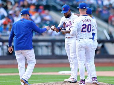 Santiago Espinal hits 2-run double to lift Reds over Mets 3-1