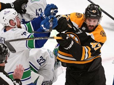 DeBrusk scores in return to Boston as Canucks shut out Bruins 2-0 behind Lankinen