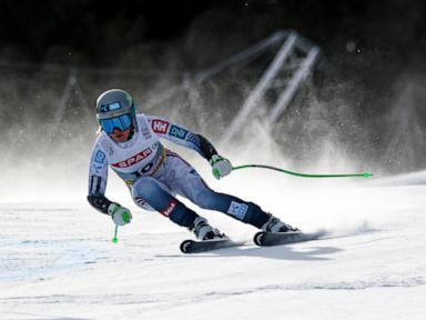 Austrian skier Stephanie Venier wins the women's super-G at the worlds. Vonn hooks gate and DNF