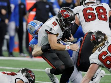 Mayfield runs for a TD and throws a TD pass, lifting Bucs to 20-16 win over Lions in playoff rematch