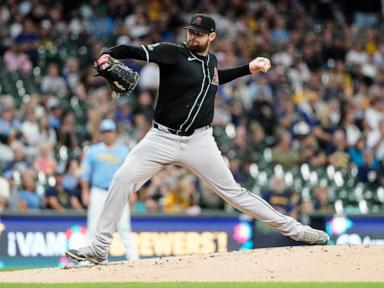 Montgomery exercises $22.5M option with D-backs, Pederson opts out, AP source says