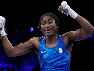 Refugee Olympic Team boxer Cindy Ngamba wins opening bout, beating ex-world champion
