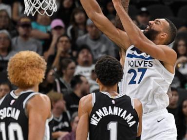 Johnson and Paul lead Spurs past Timberwolves 113-103 as Popovich misses game with illness