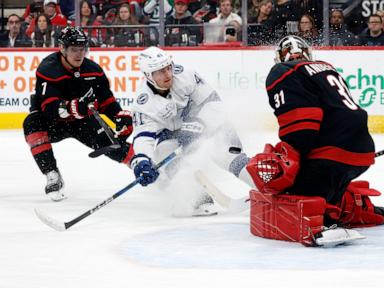 Kucherov scores go-ahead goal, two empty-netters to push Lightning past Hurricanes in season opener