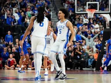 Kansas center Hunter Dickinson ejected for kicking Duke's Maliq Brown in the head