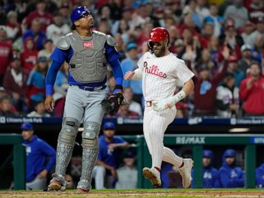 Schwarber and Realmuto homer as Phillies top Cubs 6-2 to clinch 1st NL East title since 2011