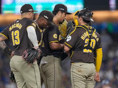 Tossed balls from stands, apparently aimed at Profar, interrupt Padres' win in NLDS Game 2